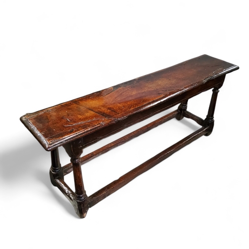 754 - A mid 17th century English oak joint stool bench,46cm high, 121cm wide, 25cm depth