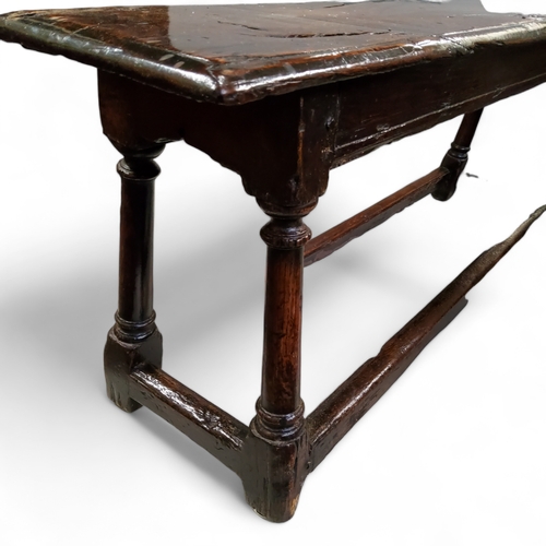 754 - A mid 17th century English oak joint stool bench,46cm high, 121cm wide, 25cm depth