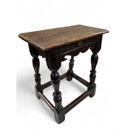 758 - An early 17th century English oak joint stool, 61cm high, 53.5cm wide, 28.5cm depth