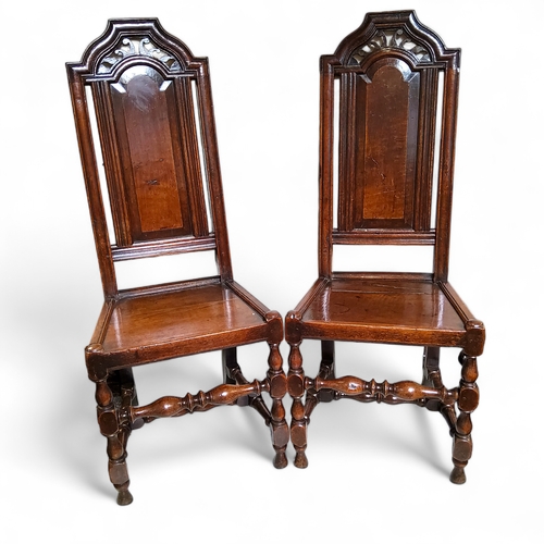 759 - A pair of 17th century Charles II oak hall chairs c.1680, 120cm high, 46cm wide, 53cm deep, seat hei... 