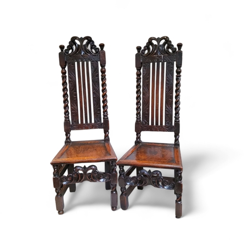 761 - A fine pair of Charles II oak high back hall chairs c.1680