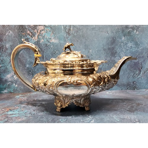 59 - A George IV silver three piece compressed ovoid tea service, embossed with flowers and leafy scrolls... 