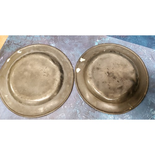 551 - Five 18th century pewter plates, 24cm diam, London touch marks; a similar pair, 30.5cm diam, c.1760 ... 