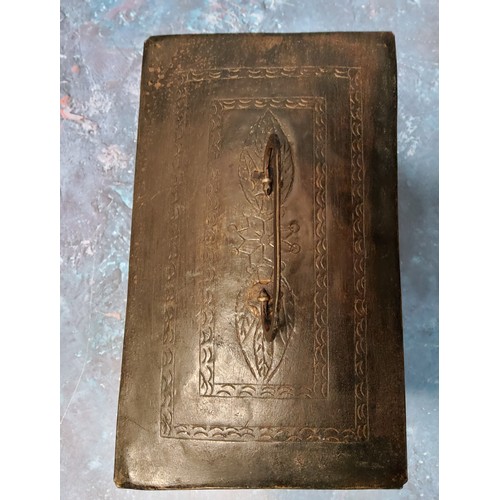 557 - A Dutch tin rectangular box, engraved with bands and leaves, bold lock, stile legs, 21cm wide, 14.5c... 