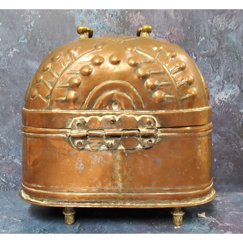 814 - A 19th copper travelling warmer, possibly Turkish, embossed with stylised leaves, 24cm high, 24cm wi... 