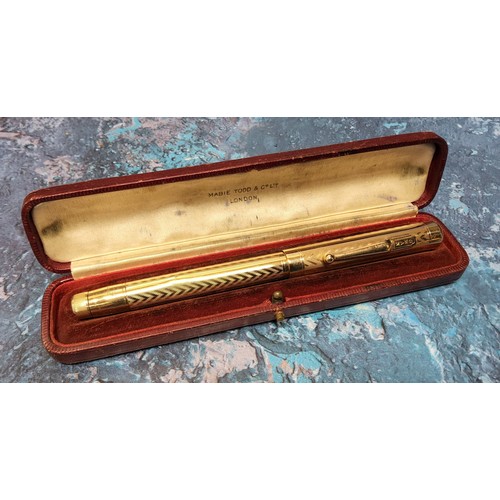 153 - A gold plated Swan Mabie Todd & Co leverless fountain pen, 14ct nib, cased