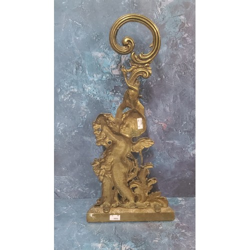 835 - A Victorian brass door stop, cast with a cherub and scrolling foliage, 49cm high, c.1860