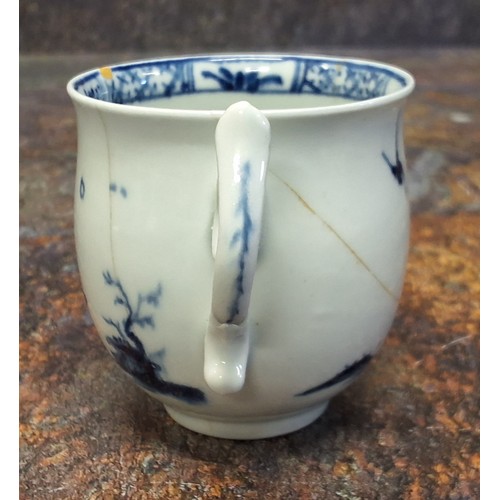 254 - A Worcester Walk in the Garden pattern bell shaped coffee cup,  tau handle, decorated in underglaze ... 