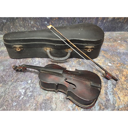 498 - An early 20th century miniature apprentice violin, 15cm back, the case with label ' la premier piece... 