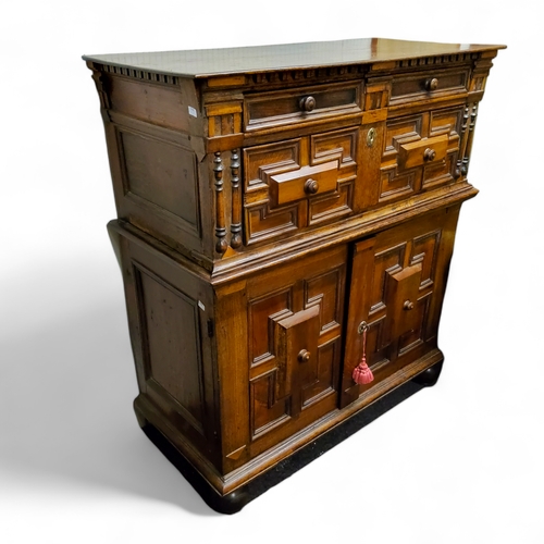 461 - An 18th century oak and walnut house keeper's cupboard or buffet, geometric and half bobbin turned m... 