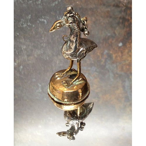 150 - A Burmese plated opium weight, in the form of a bird, 6.25cm high, 19th century