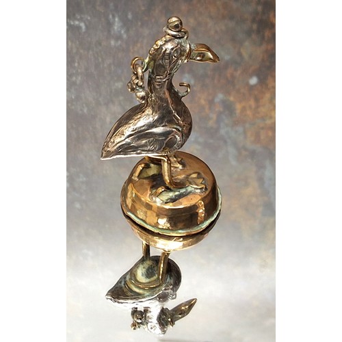 150 - A Burmese plated opium weight, in the form of a bird, 6.25cm high, 19th century