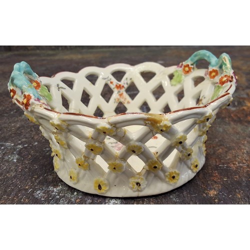 292 - A Derby two-handled flared basket, pierced diaper sides, painted with stylised flowers, double rope ... 