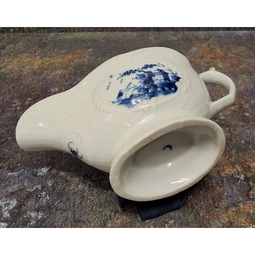 252 - A Worcester Little Fisherman pattern sauce boat, loop handle, scroll thumb piece, painted in undergl... 