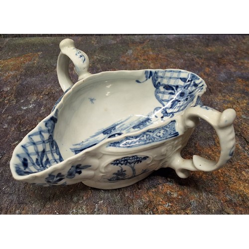 258 - A Worcester two handled sauceboat, painted with the Two Handled sauceboat landscape with four circul... 