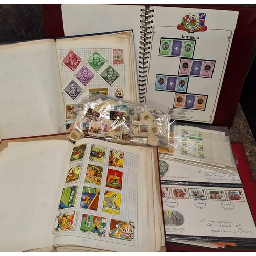 1052 - Stamps- a carton containing all world stamps in four binders and a number of stamps loose or in plas... 