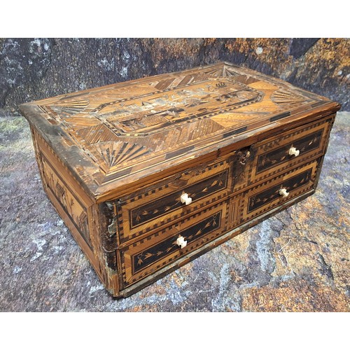 440 - A Napoleonic prisoner of war straw work box, hinged cover decorated with buildings, above one blind ... 