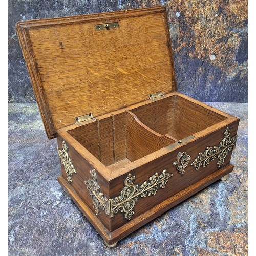 448 - A Victorian oak cigar box, with bold brass foliate hinges, 11cm high, 21.5cm wide, c.1880