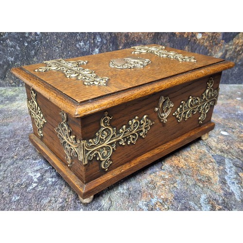 448 - A Victorian oak cigar box, with bold brass foliate hinges, 11cm high, 21.5cm wide, c.1880