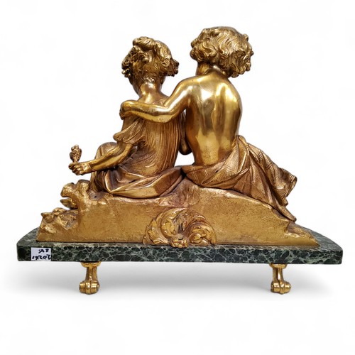 501 - French School, late 19th century, gilt bronze sculpture of two children with a bird's nest, green ma... 