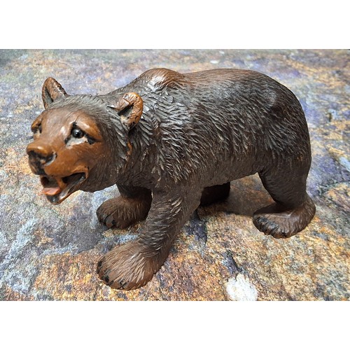 426 - An early 20th century Black Forest Black Forest bear, standing, 9cm high, c.1900