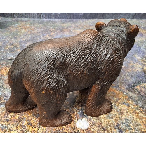 426 - An early 20th century Black Forest Black Forest bear, standing, 9cm high, c.1900