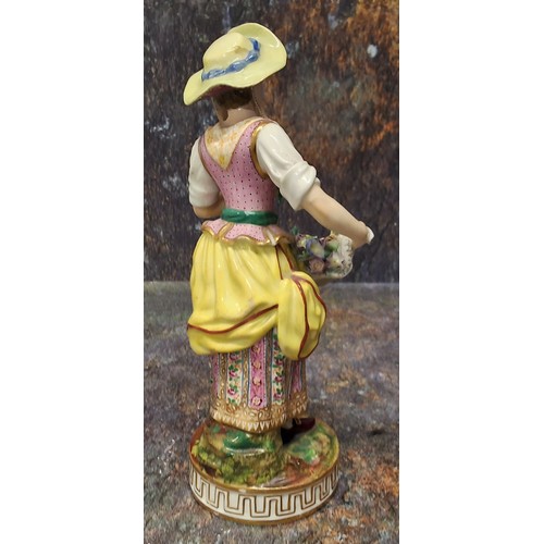 180 - A Minton figure., The Flower Gathers, she stands holding an apron full of flowers,  circular Greek k... 