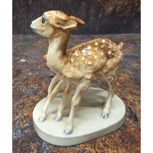 248 - A Royal Worcester pre-production model of Fawns,  by Doris Lindner, oval base, 12cm high,  c. 1950