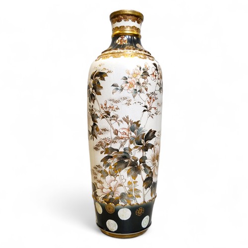 355 - A large Japanese satsuma slender ovoid vase, decorated with peonies, blossoming branches, and butter... 