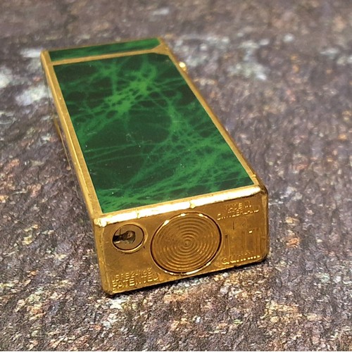 949 - ***Please note this lot will be sold after 880 DAY ONE** Dunhill Rollgas lighter, gold plated and gr... 