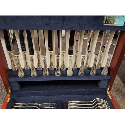 69 - A canteen of silver beaded flatware, for eight, with ribbon tied harebells, comprising soup spoons, ... 