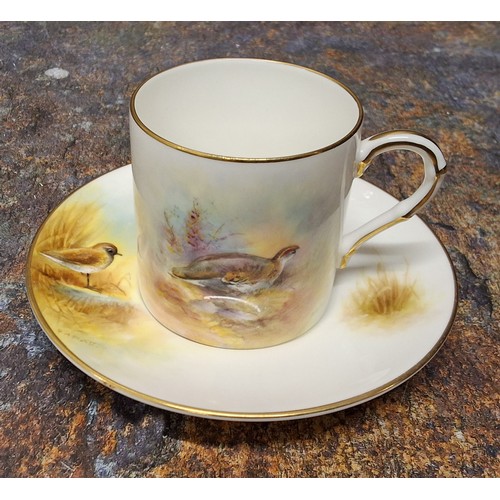 240 - A Royal Worcester coffee can and saucer, painted by P. Platts, signed, with Ptarmigan and Golden Plo... 