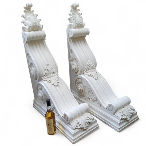 873 - Architectural Salvage - a pair of substantial plaster cast corbels, 104cm high, 70cm deep