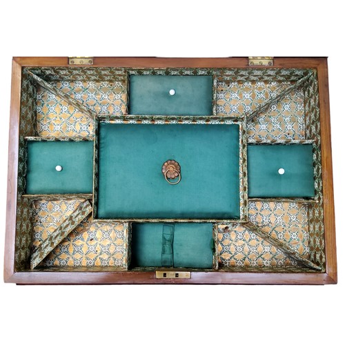 878 - A Victorian walnut work/games compendium,  inlaid in coloured woods with chessboard, conforming... 