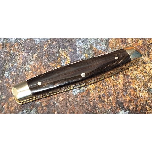 630 - A Stan Shaw four blade pocket knife, polished horn scales, vacant cartouche, workback to springs and... 