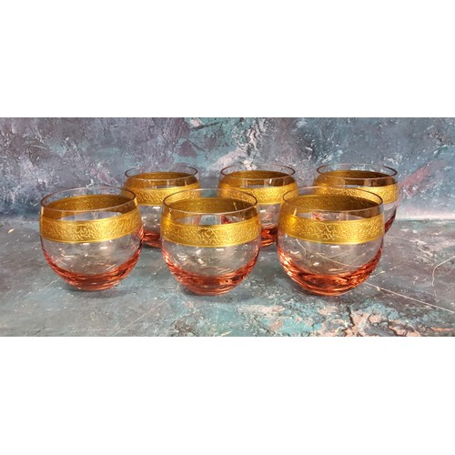 5 - A set of six Mosers pink flashed glass tumblers,  gilt band with scrolling foliage, etched mark