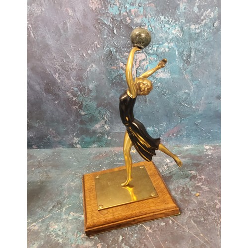 30 - Art Deco, a gilt metal figure, lady dancing with a ball, 30cm high