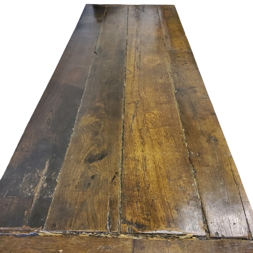 737 - A large 19th century oak four plank refectory table.Please note viewing and collection for this lot ... 