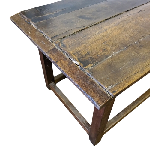 737 - A large 19th century oak four plank refectory table.Please note viewing and collection for this lot ... 