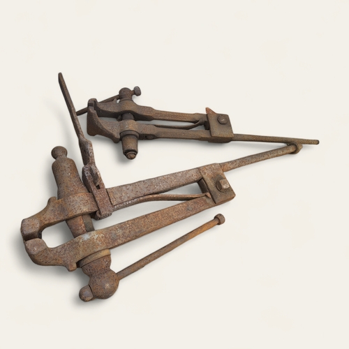 423 - Two early 20th century blacksmiths leg vices