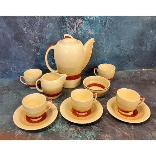 38 - A Susie Cooper Kestrel shape coffee service, banded in tan in and grey, comprising coffee pot, milk ... 