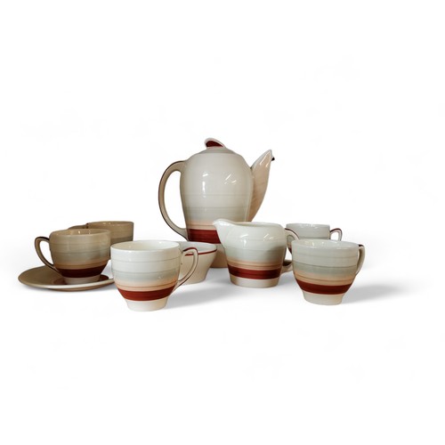 38 - A Susie Cooper Kestrel shape coffee service, banded in tan in and grey, comprising coffee pot, milk ... 