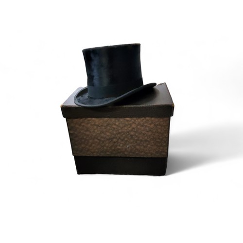 36 - A Dunn & Co top hat, approx 6 3/4, 20cm x 16cm, cardboard box