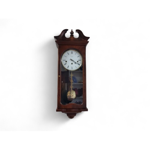 69 - A contemporary mahogany wall clock, the white dial inscribed Committi, London, three winding holes, ... 