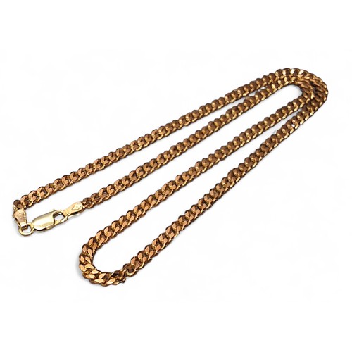 231 - A 9ct gold curb link necklace, 20.58g