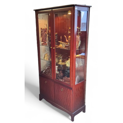 432 - A Stag glazed display cabinet, 180cm high, 90cm wide