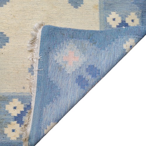 452 - A Swedish flat weave carpet, signed by Svensk Hemslöjd “SH” in pastel tones, 138cm ... 