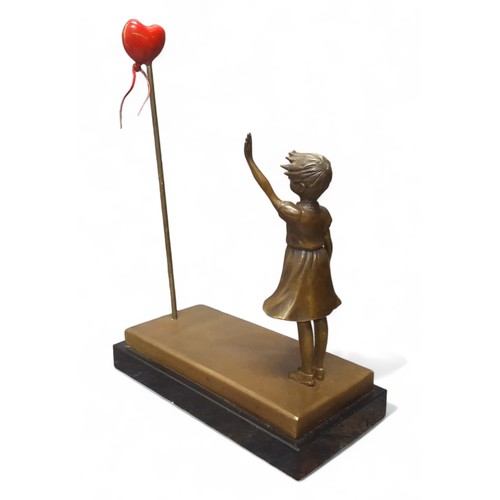 455 - After Banksy, bronze balloon girl, black marble rectangular base,  40cm high