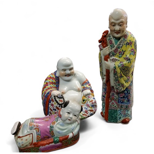 145 - A Chinese Republic period polychrome seated figure of Buddha, 27cm high, seal mark;  a similar ... 