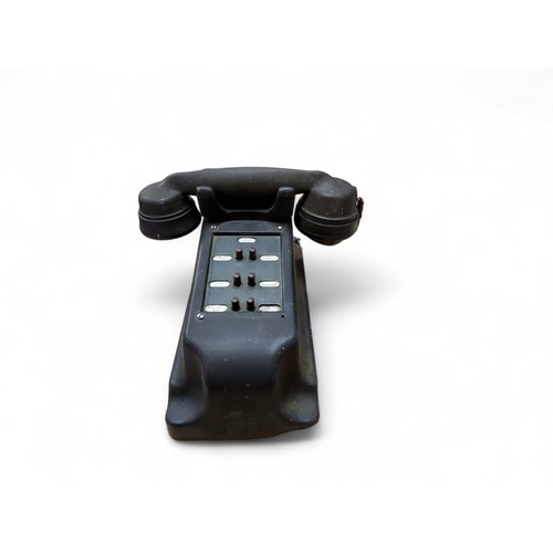 179 - A mid 20th century black bakelite receptionist telephone, c.1940;  an early 20th century storage box... 